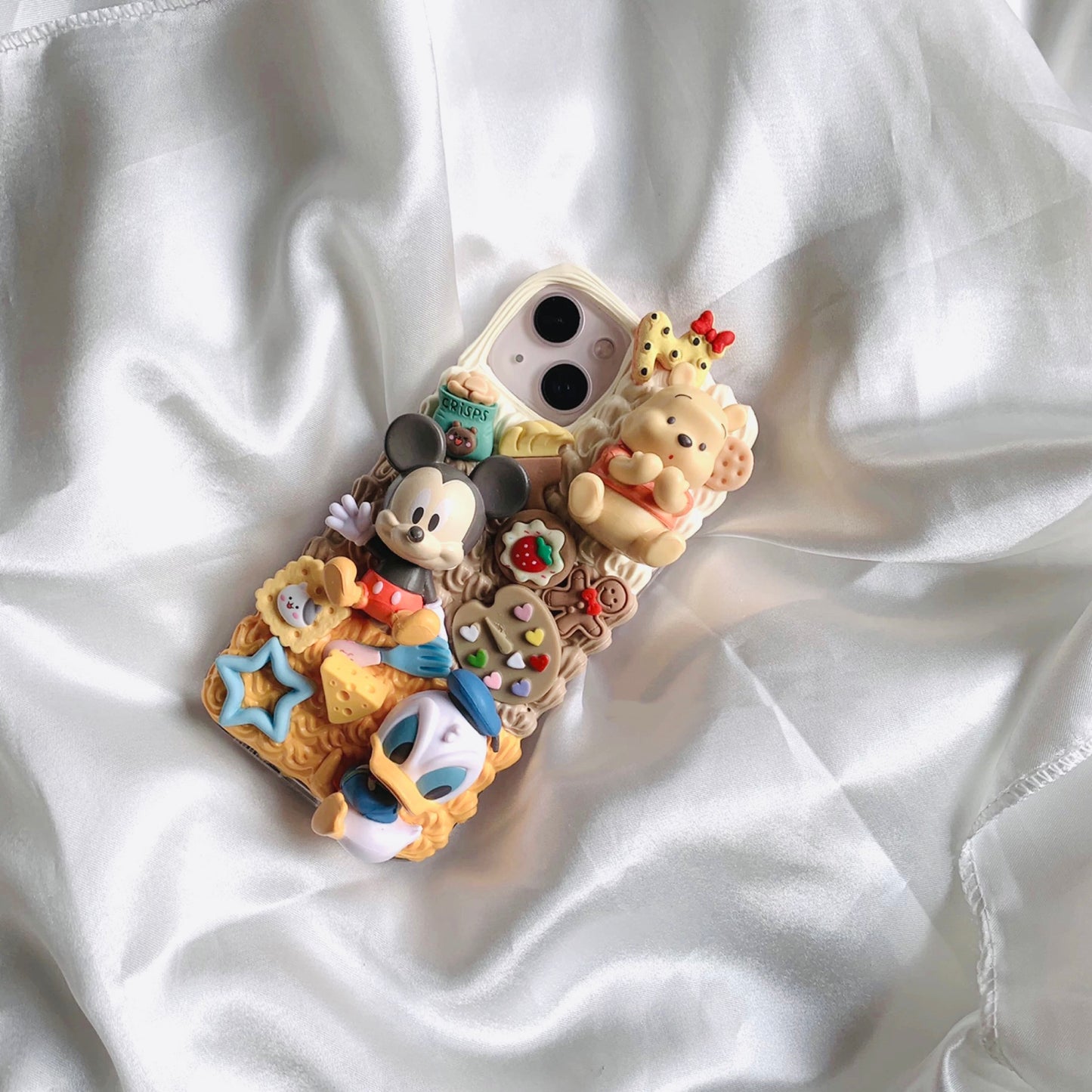 Phone cases with cartoon figures (Mick*y mouse)