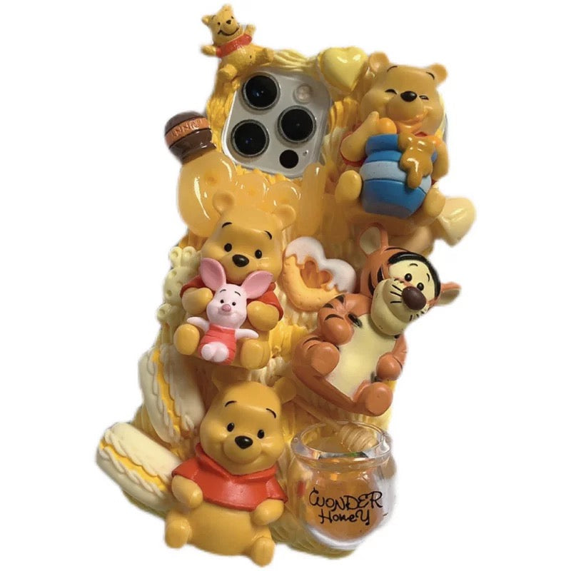 Phone case with cartoon figures ( Winnie the Pooh)