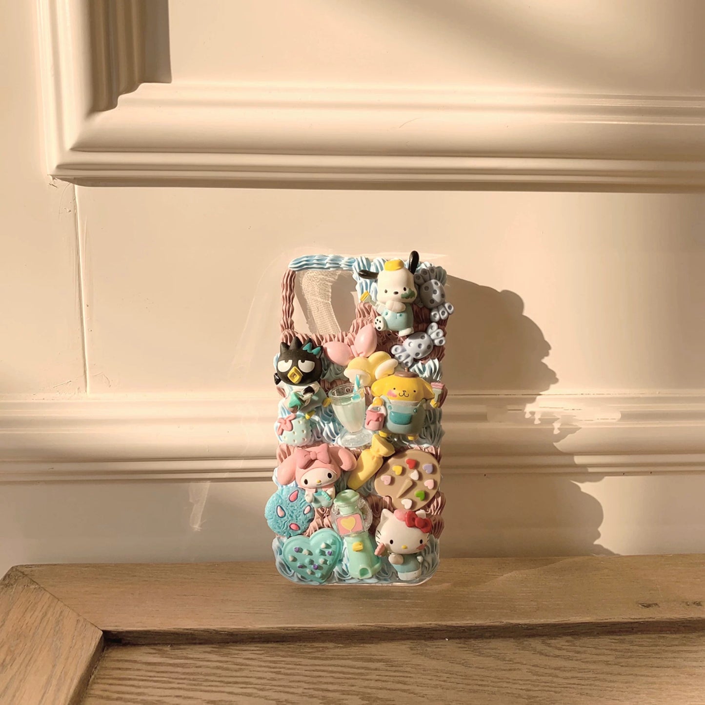 Phone cases with cartoon figures (Sanrio)