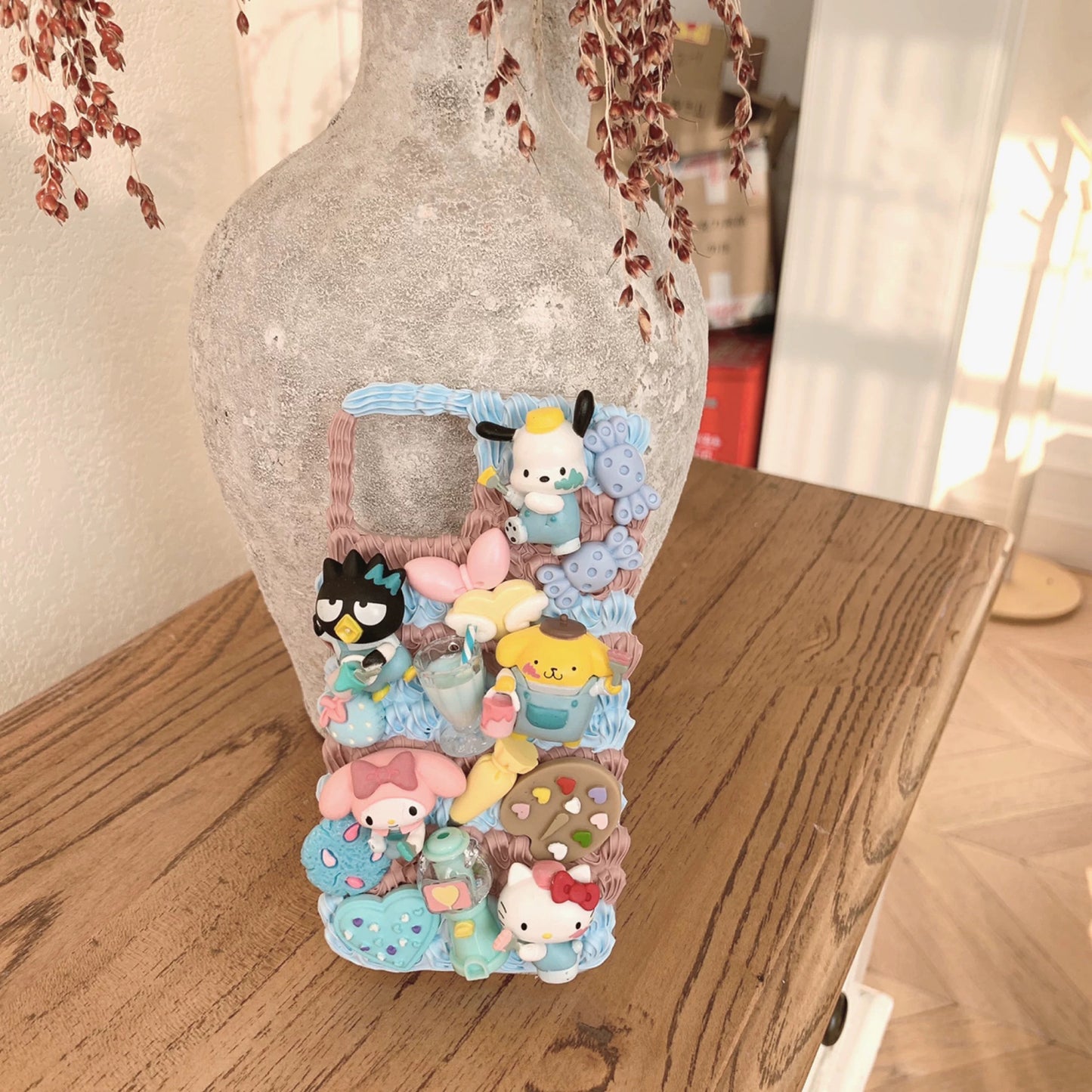Phone cases with cartoon figures (Sanrio)