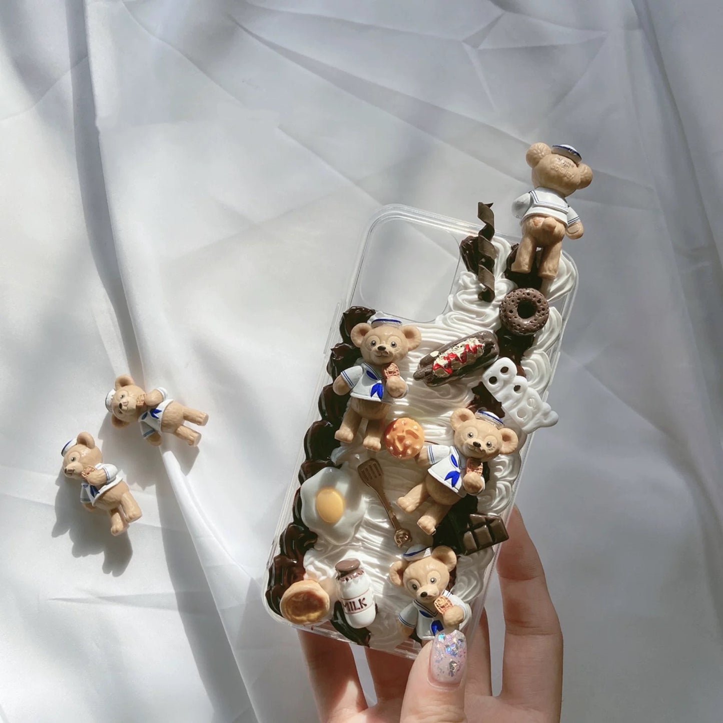 Phone cases with cartoon figures ( Duffy and his friends)