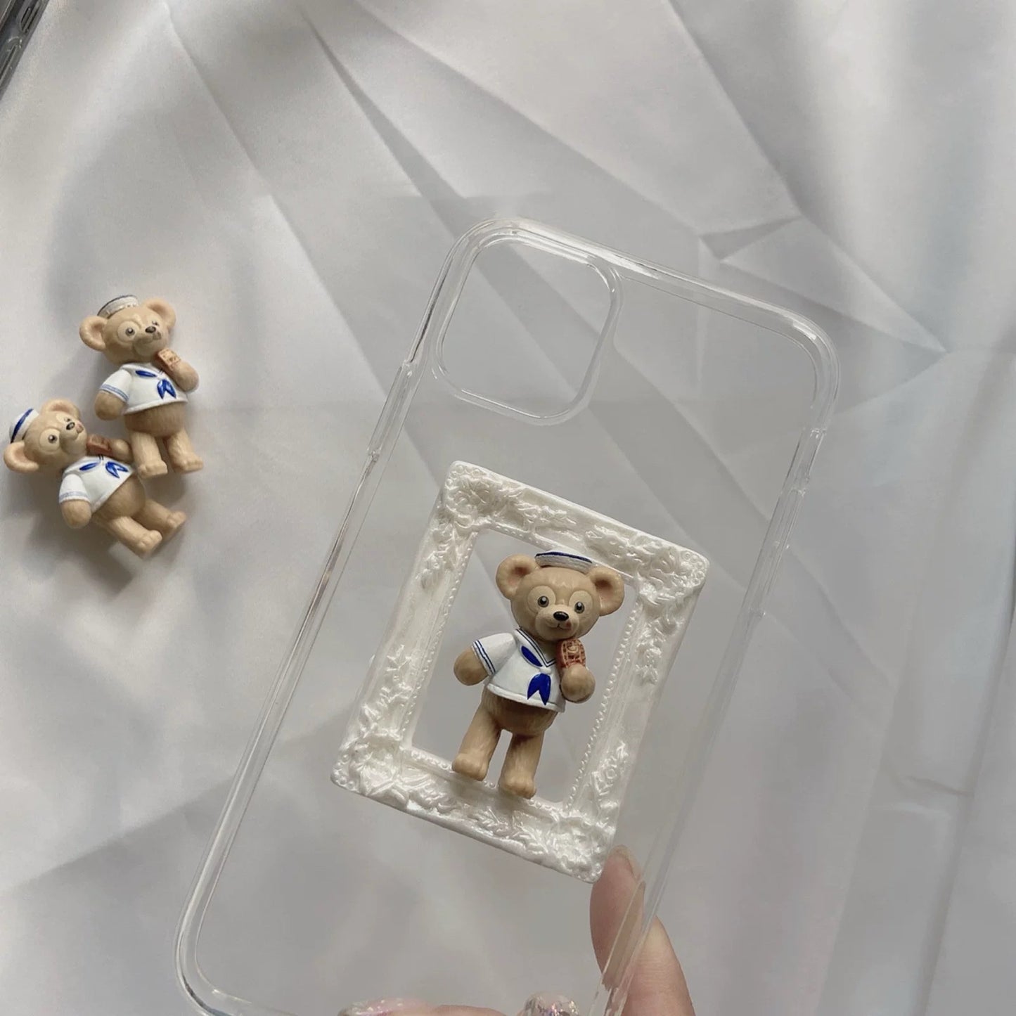 Phone cases with cartoon figures ( Duffy and his friends)