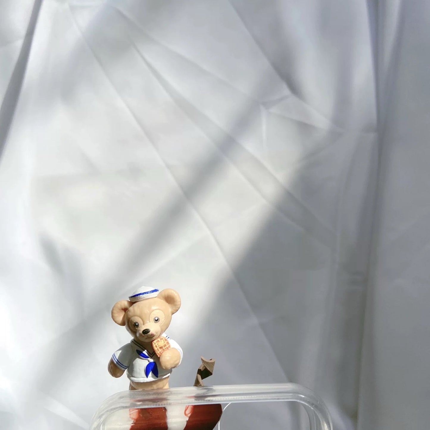 Phone cases with cartoon figures ( Duffy and his friends)