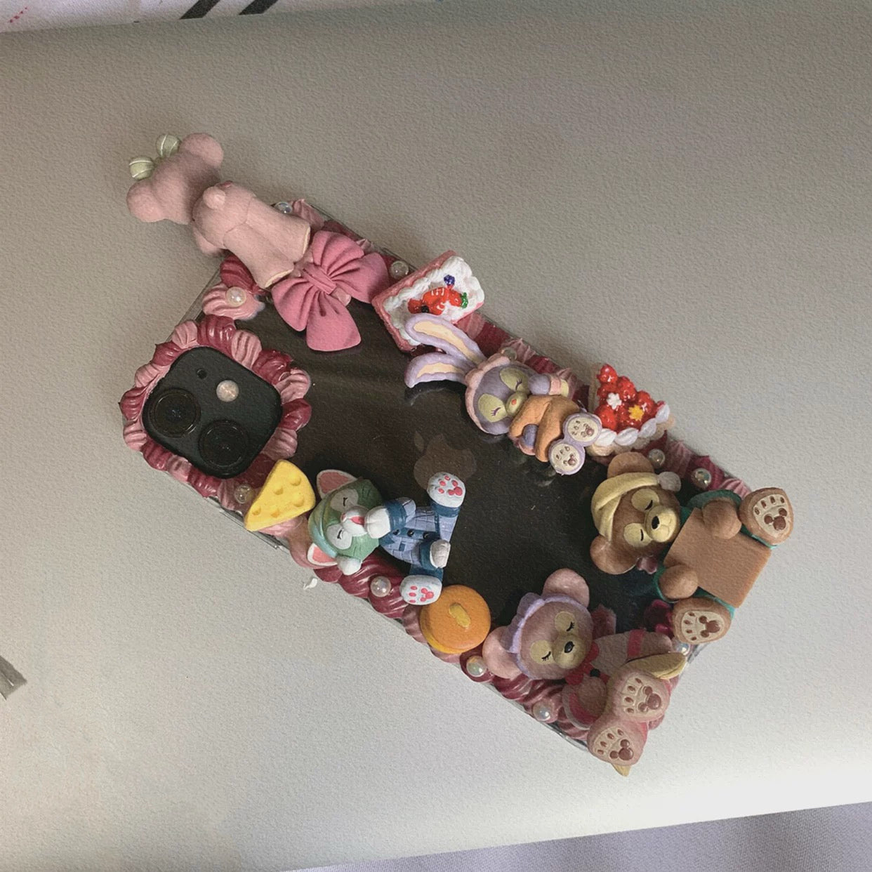 Phone case with cartoon figures (Duffy and his friends - ShellieMay)