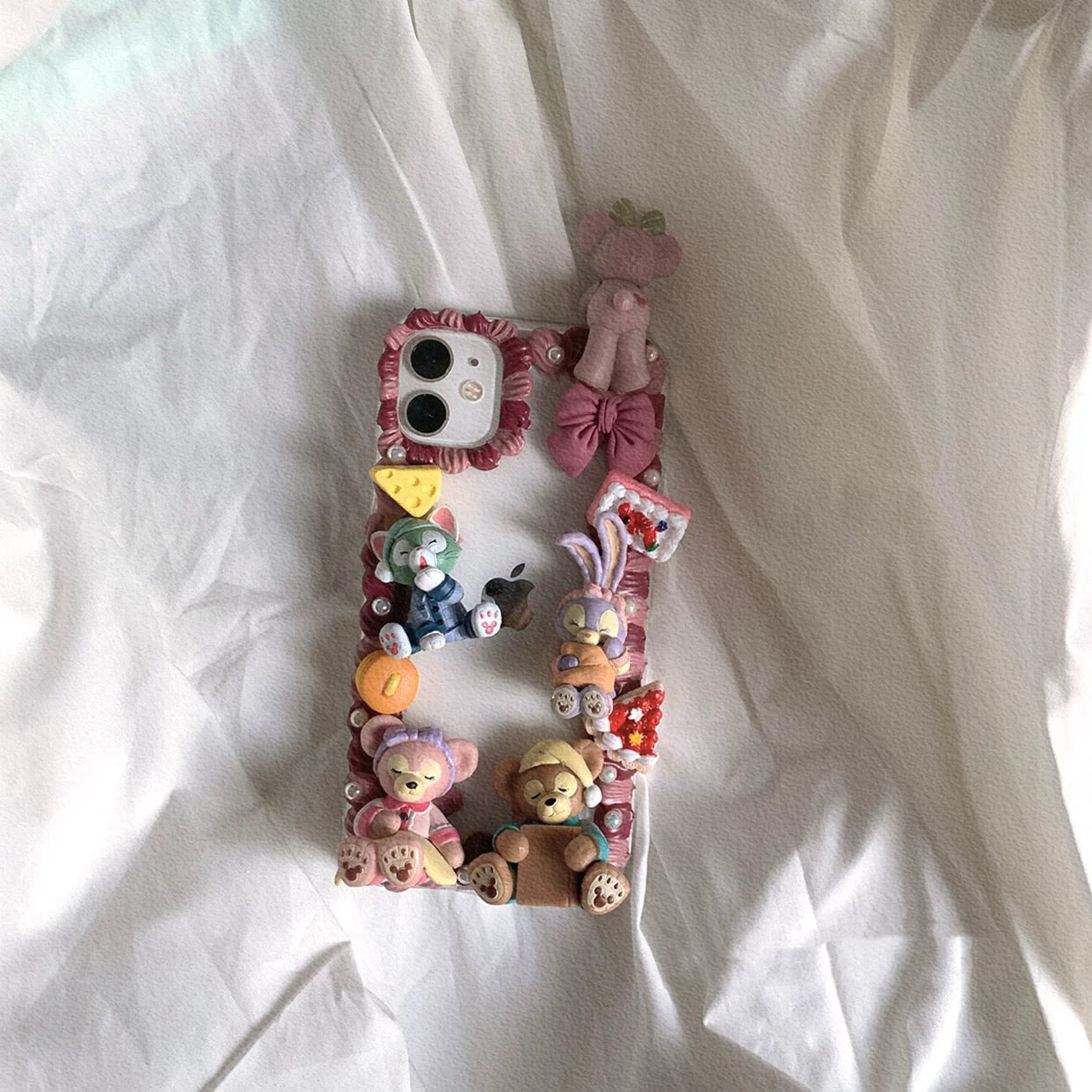 Phone case with cartoon figures (Duffy and his friends - ShellieMay)